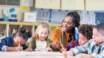 international teacher with students