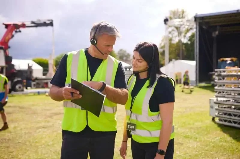 Construction workers reviewing plans