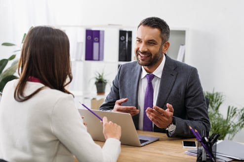 selective-focus-of-advisor-sitting-at-table-with-l-2026-01-06-00-29-19